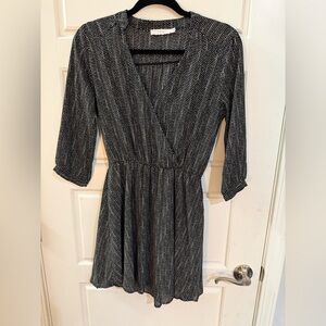 Lush Black and White Polka Dot Dress with a V Neck and 3/4 length sleeves